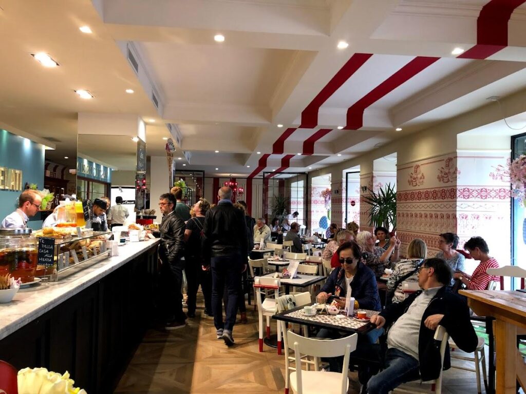 the interior of Caffe Walner busy while serving customers