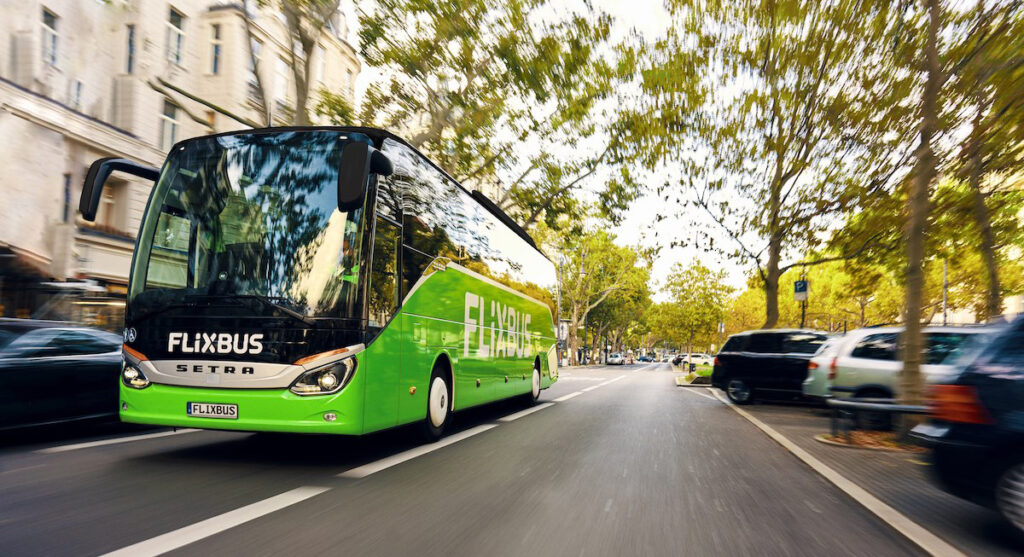 a Flixbus drives down an Italian street