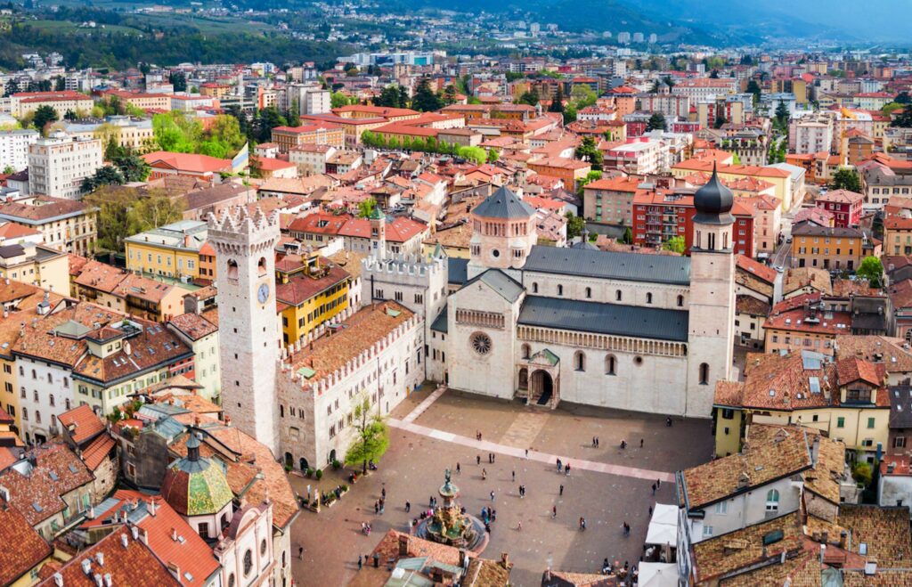 an aerial view of Trento, Italy during the daytime